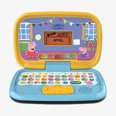 Spielzeug-Laptop mit Peppa Pig – Bildschirm zeigt das Wort "APFEL" und Bilder von Apfel und Banane, bunte Tastatur darunter