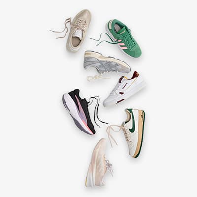 Verschiedene Sneaker in diversen Farben und Designs, einige mit sichtbaren Schnürsenkeln, auf weißem Hintergrund verteilt.