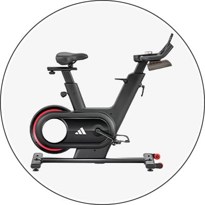 Schwarzes Indoor-Cycling-Bike mit rotem Akzent und integriertem Bildschirm