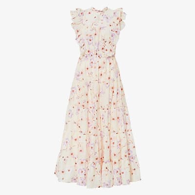 Fließendes, langes Kleid mit Blumenmuster und Rüschen am Kragen und an den Ärmeln.