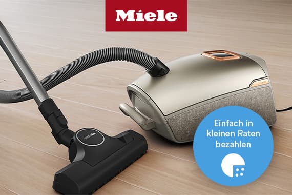 Einfach in kleinen Raten bezahlen – Miele Staubsauger mit Bodendüse auf hellem Holzboden