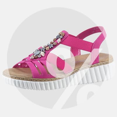 Pinke Sandale mit Riemen und glitzernden Verzierungen auf dicker weißer Profilsohle, seitlich freigestellt